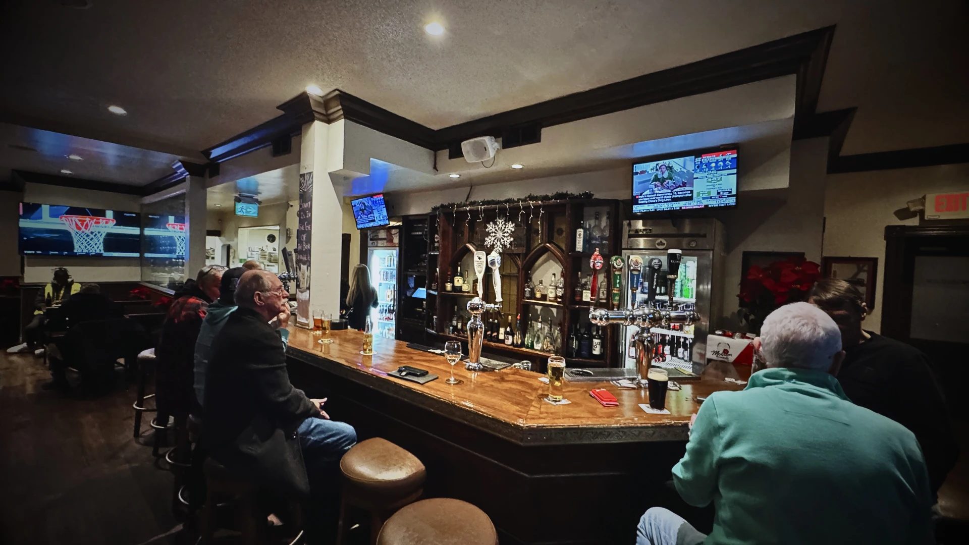 Regulars at the main bar of The Franklin House